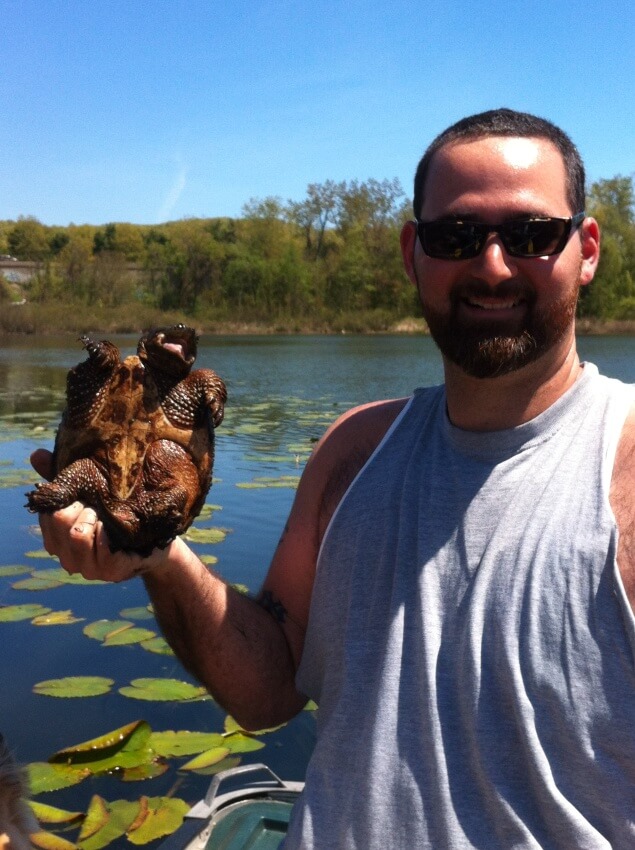 Senior Director Anthony Pierlioni with a Common Snapping Turtle, Chelydra serpentina